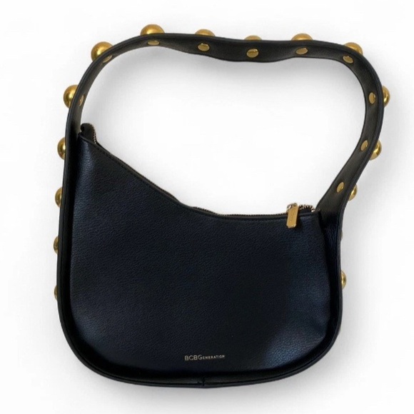 BCBGeneration Handbags - BCBGeneration Black Faux Leather Asymmetrical
Hobo Bag w/ Gold Tone Stud Strap